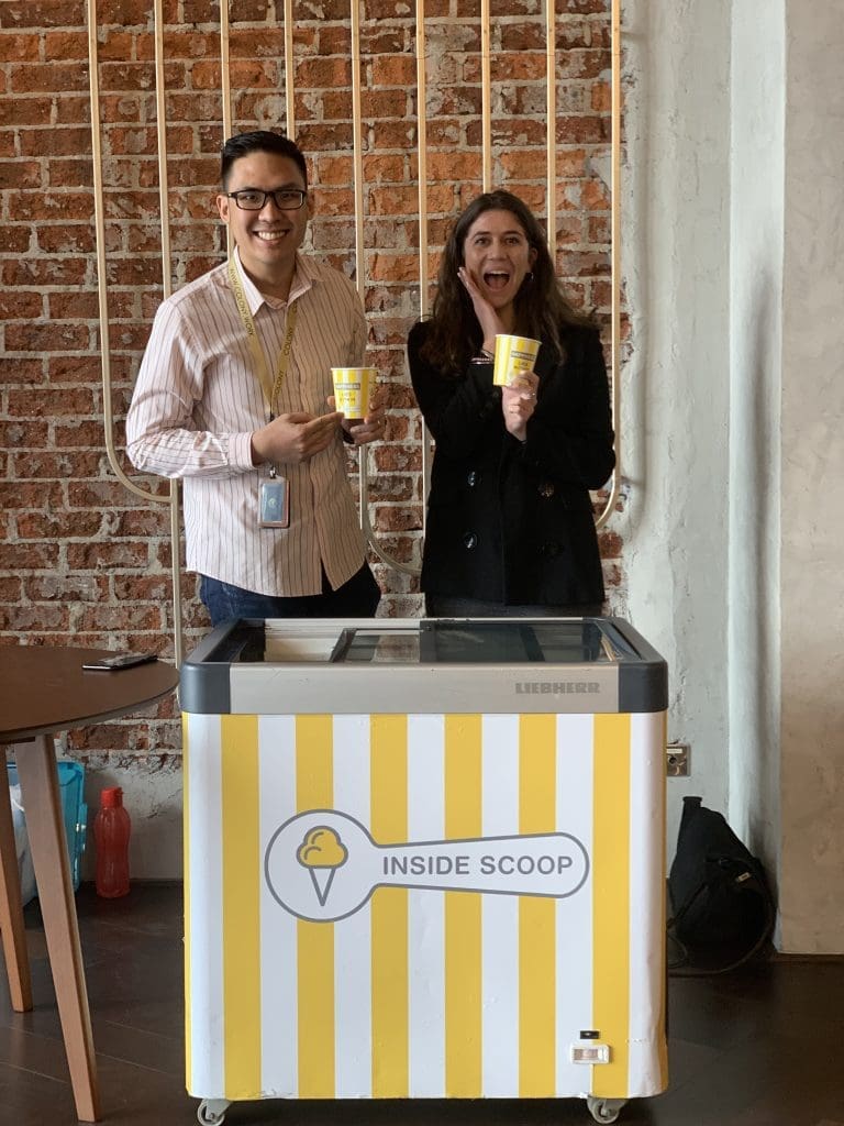 2 people standing behind an ice cream booth showcasing Inside Scoop at our Star Boulevard Event Space KL